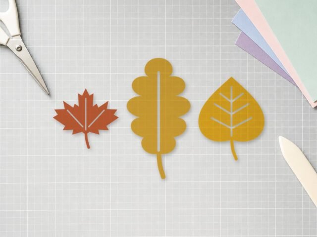 Free Fall Leaves SVG Set design cut out and laid on a cutting mat