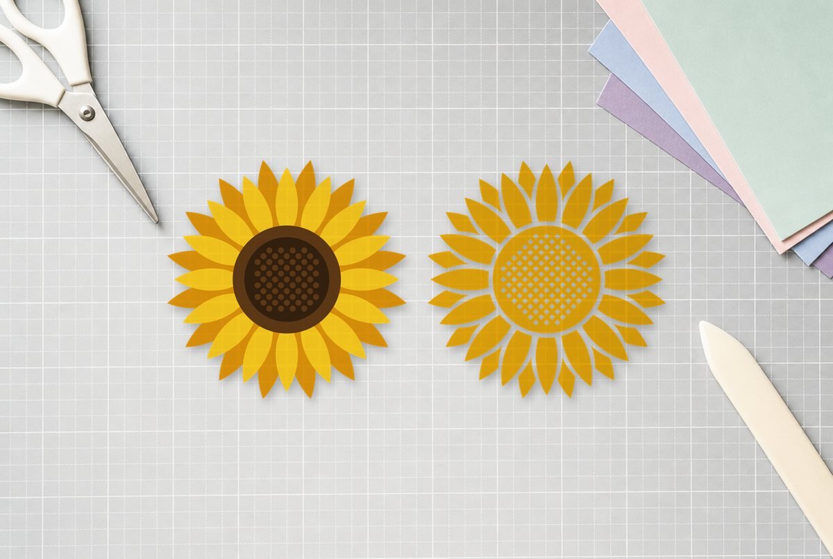 Free Sunflower SVG Free Sunflower SVG design cut out and laid on a cutting mat